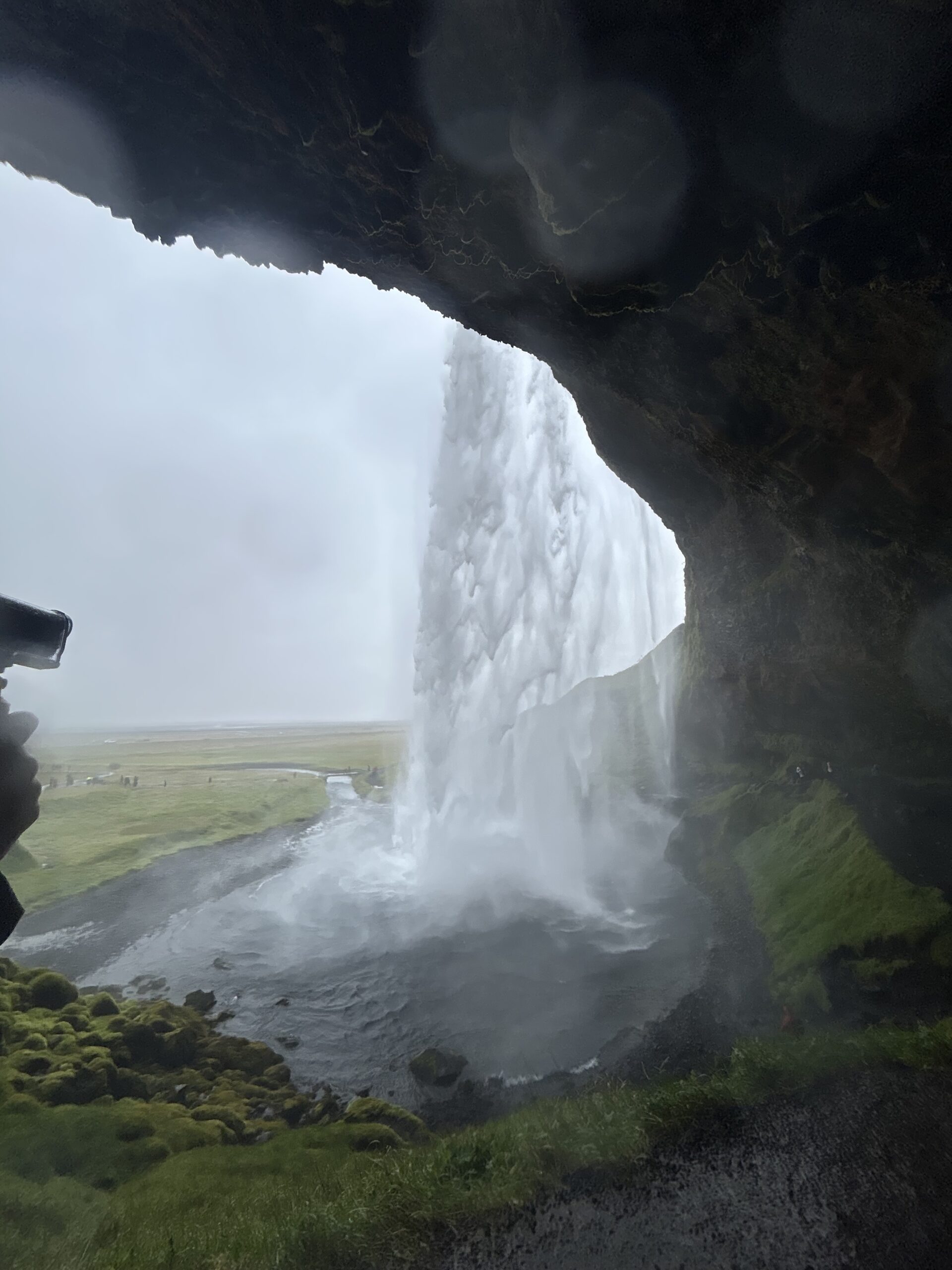 Behind Seljalandsfoss Waterfall in Iceland.