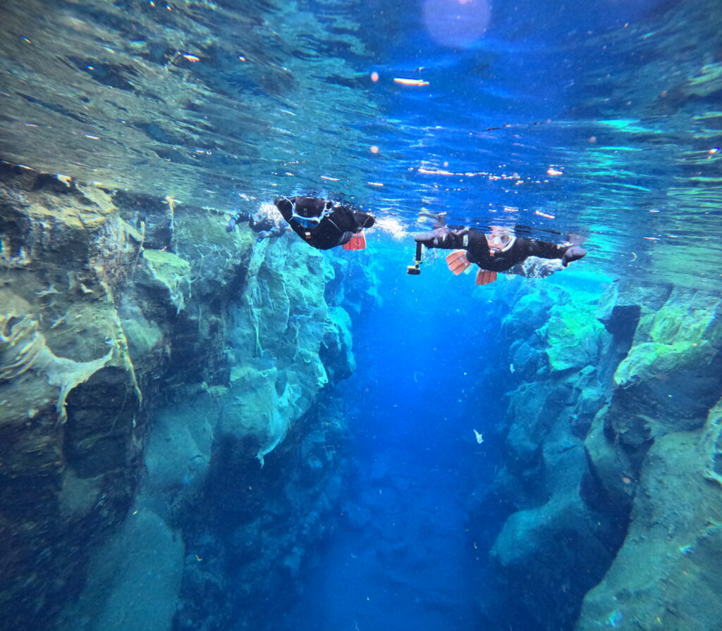 A Big Ravine Snorkeling in the Silfra Fissure in Iceland